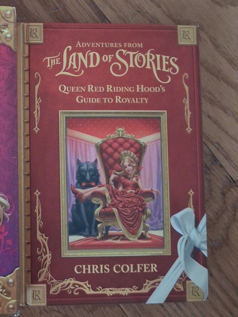 The Land of Stories Hardback Book. Queen Red Ruding Hoods Guide To Royalty
